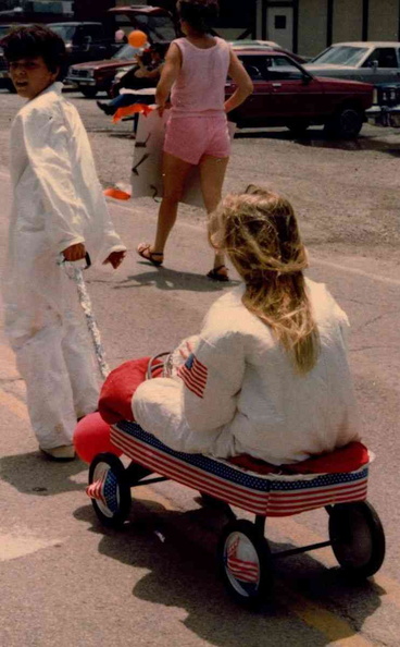 1983 4th of July Parade, Jennifer Ellingham in Wagon.jpg