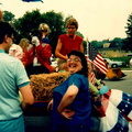 1984 4th of July Parade, Toni Miller on float, Mariellen Plecki grinning