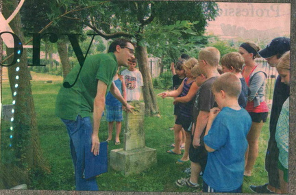 Matt Galik conducting cemetery tour newspaper photo (2)