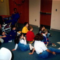 1997 Trim-the-Tree Party kids watching Rudolph