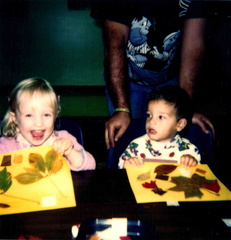 1994 Fall 2-3 yr-old Story Time Happy about her leaf collage